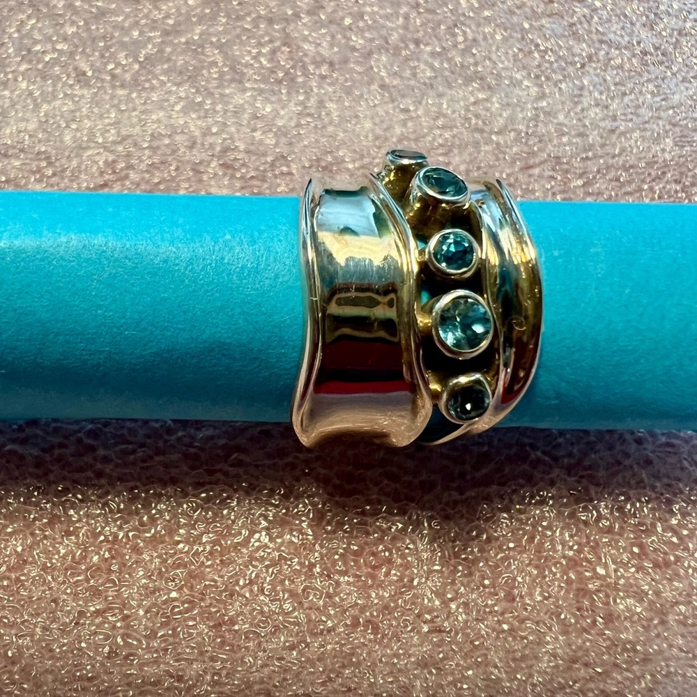 Ring by HG Israel, with blue topaz, 925 sterling silver, ring size 7.25”